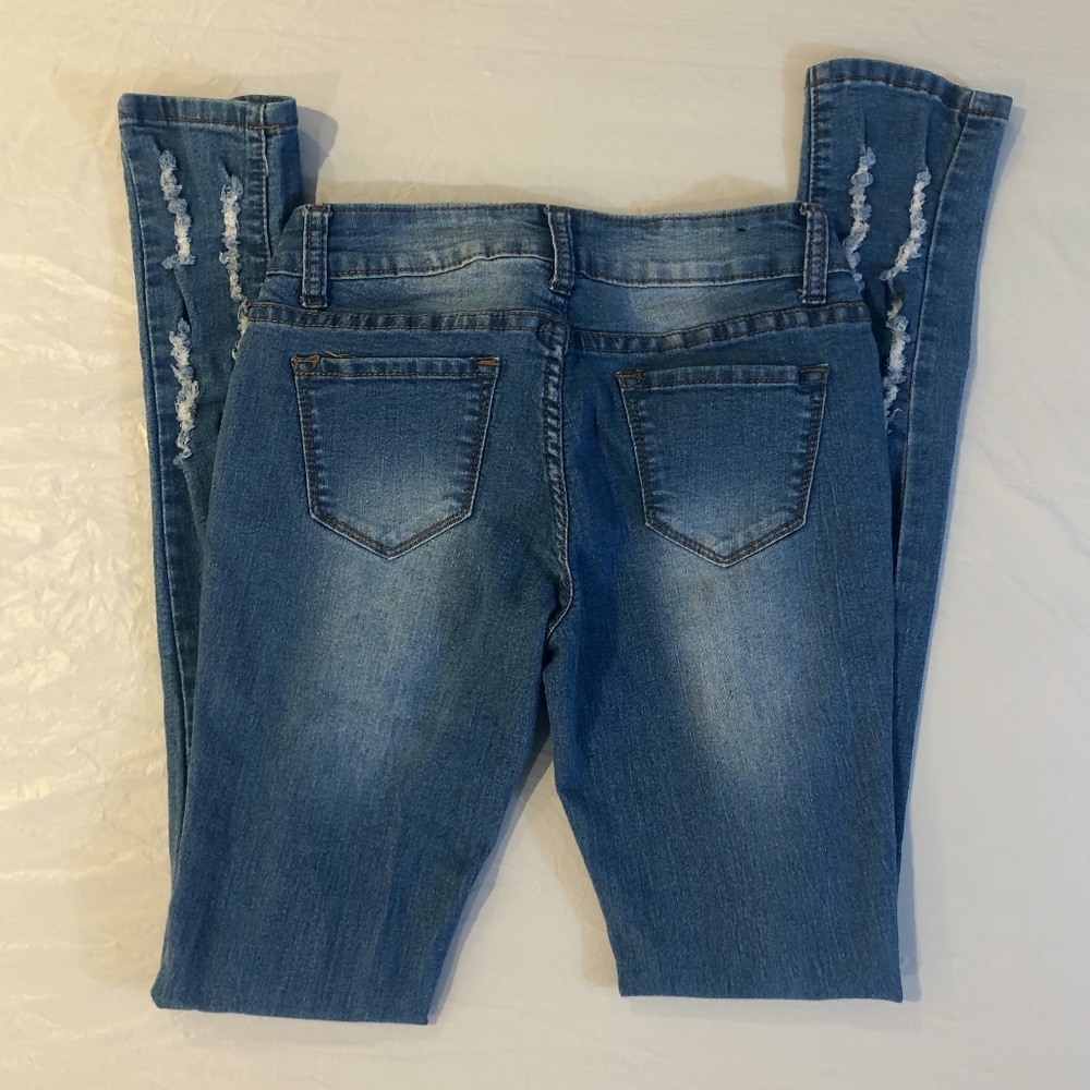 Fashion Nova Low Waisted Distressed Jeans Size 0
